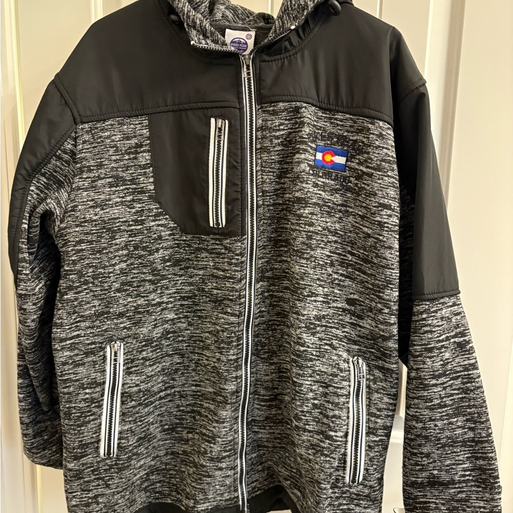 Jacket purchased at the top of Pike’s Peak, Black and Gray Hooded Jacket